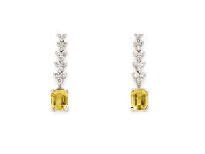 18 krt white gold earrings set with 30 brilliant diamonds and 2 yellow Beryl