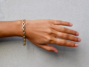 18 krt yellow gold satin and polished link bracelet