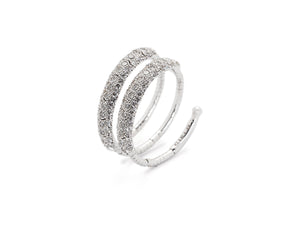 18 krt white gold spiral ring set with 84 brilliant diamonds