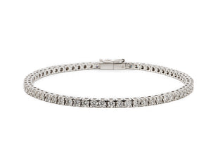 18 krt white gold tennis bracelet set with 67 brilliant diamonds