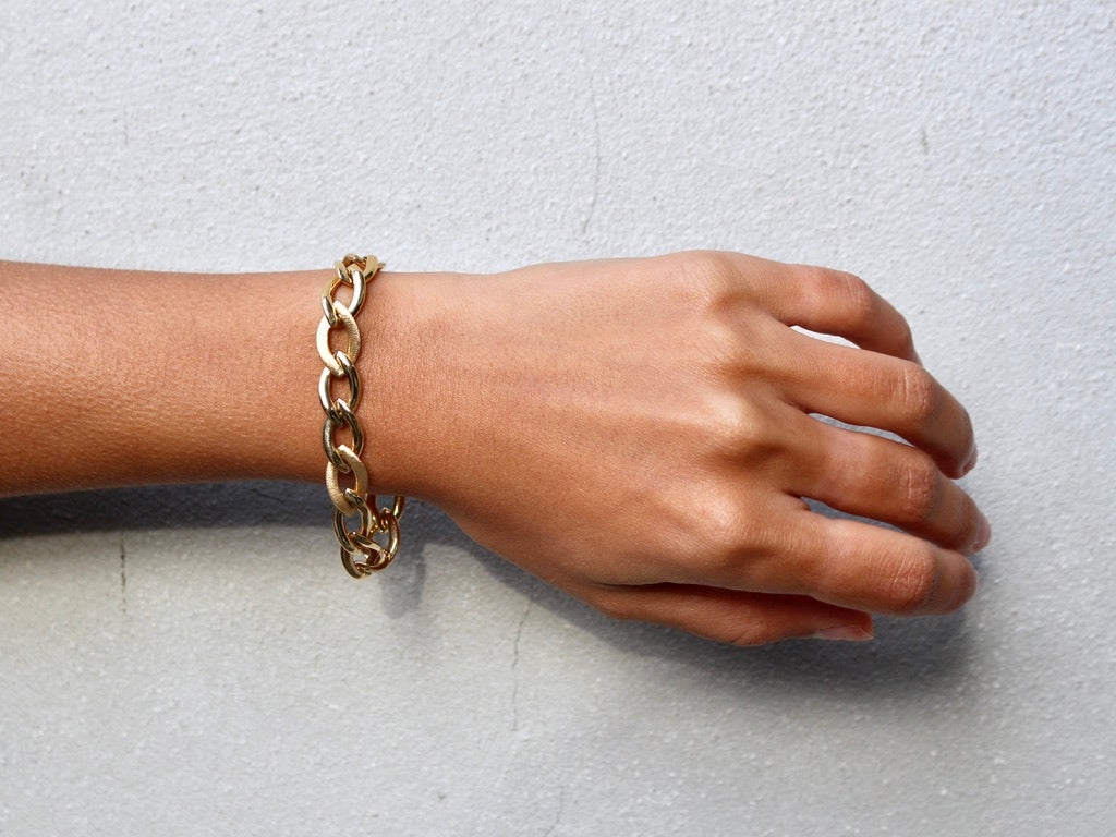 18 krt yellow gold fantasy satin/shiny link bracelet