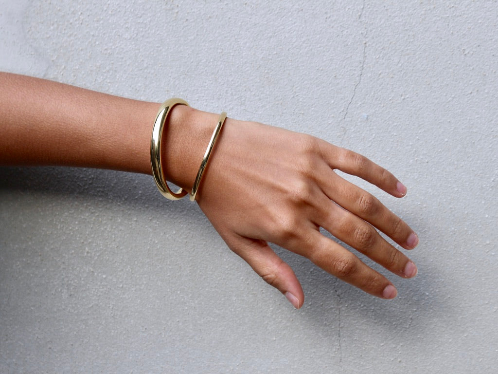 18 krt yellow gold flexible tension bracelet