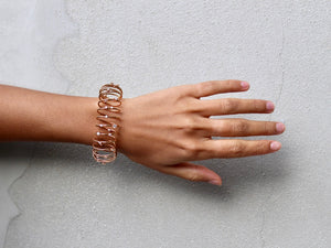 18 krt red gold flexible spiral bracelet set with 22 brilliant diamonds