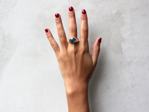 18 krt red gold ring set with cushion blue Zircon